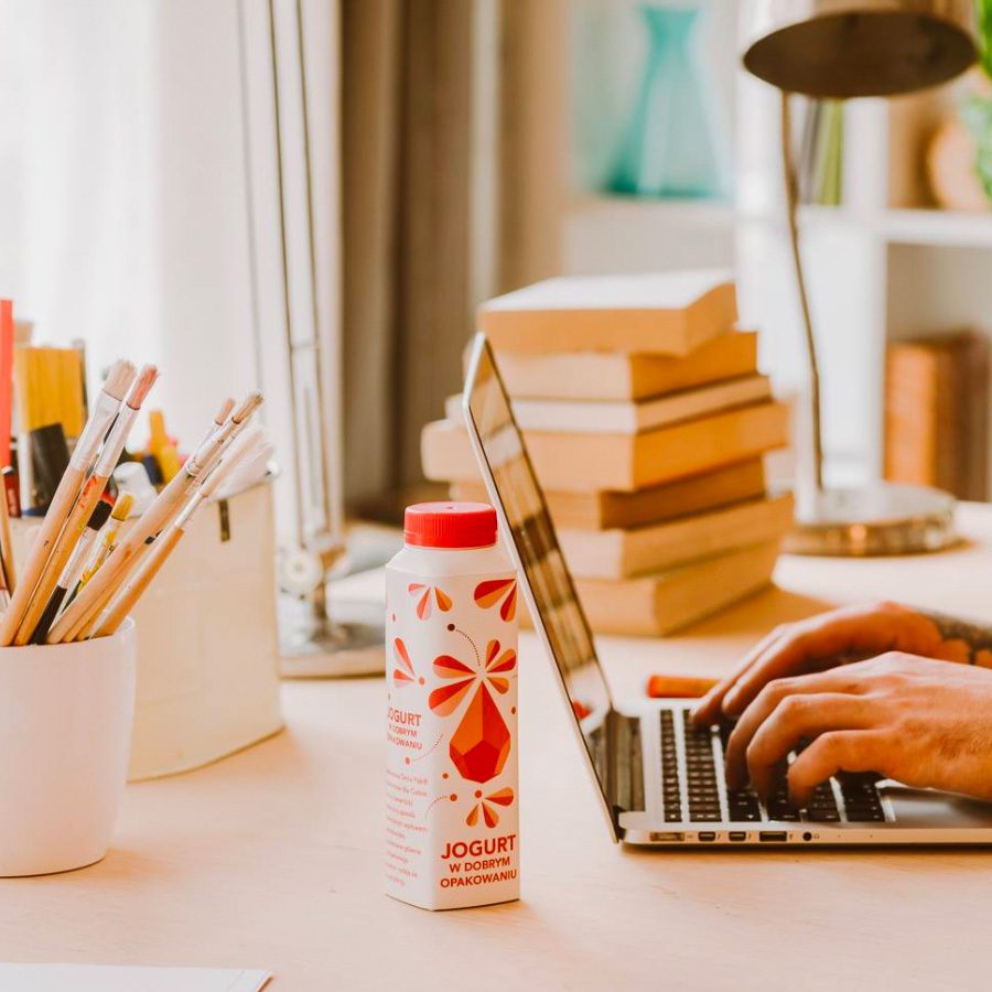 Jogurt package on office desk.