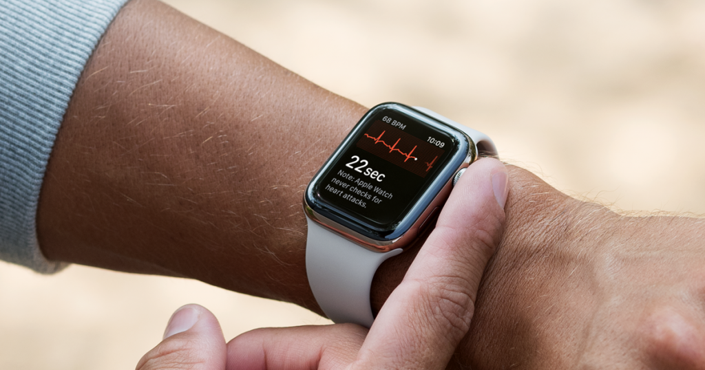 Apple Watch displays heart monitor.