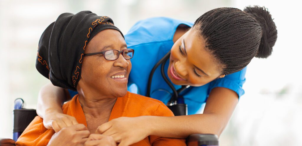 Older patient with friendly female nurse.