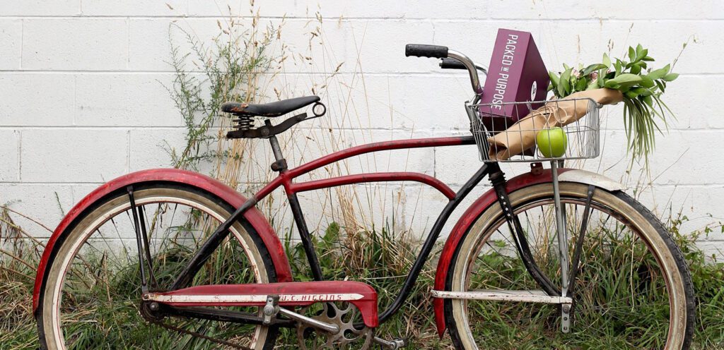 Bike leaning against wall.