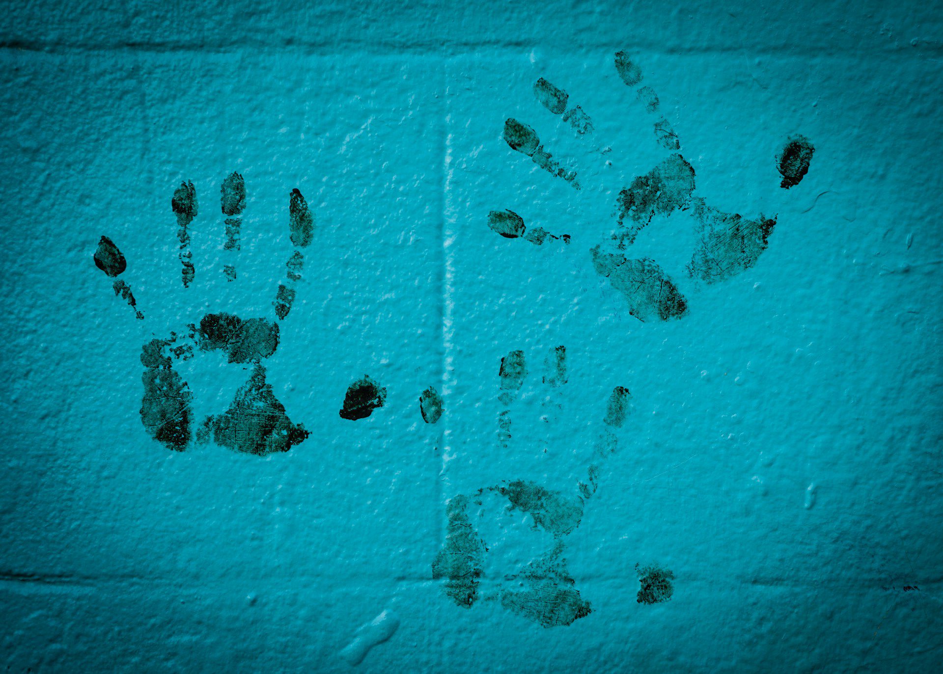 Handprints on wall.